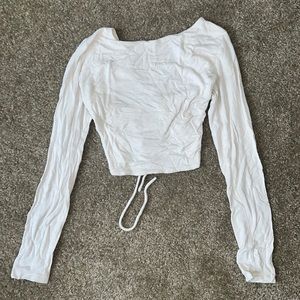 Cross back white long sleeve crop top